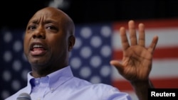 FILE - Republican presidential candidate and U.S. Senator Tim Scott speaks at a campaign town hall meeting in Manchester, New Hampshire, May 8, 2023. 