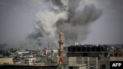 A picture taking on May 6, 2024, showing smoke billowing following bombardment east of Rafah, amid the war between Israel and Hamas.