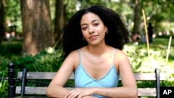 Juliana Pache poses for a photo in Washington Square Park in New York, July 16, 2024. 