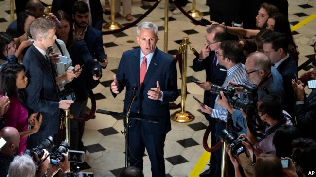 FILE - House Speaker Kevin McCarthy speaks with members of the press about debt limit negotiations, on Capitol Hill in Washington, May 24, 2023.