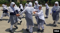 Students enjoy break time on May 27, 2023 at the Tibetan Public School situated in the historic citadel of Hari Parbat Fort, in the Tibetan colony in Srinagar, Jammu and Kashmir, India. (Bilal Hussain/VOA)