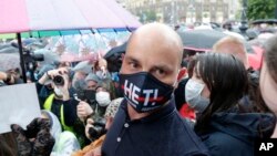 FILE - Opposition leader Andrey Pivovarov attends a rally to collect signatures to cancel the results of voting on amendments to the Constitution in Moscow, Russia, July 15, 2020. 