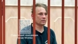 In this photo released by Basmanny District Court press service, Russian journalist Konstantin Gabov attends a hearing at a court in Moscow, on April 27, 2024, after his arrest on extremism charges, which he denied. 