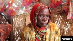 FILE - Radiya Yahia, in her 70s, speaks in Adre, Chad, of the killing of Abbakr Abdullah, a 13-year-old boy she had been caring for since his mother died seven years ago, November 14, 2023.