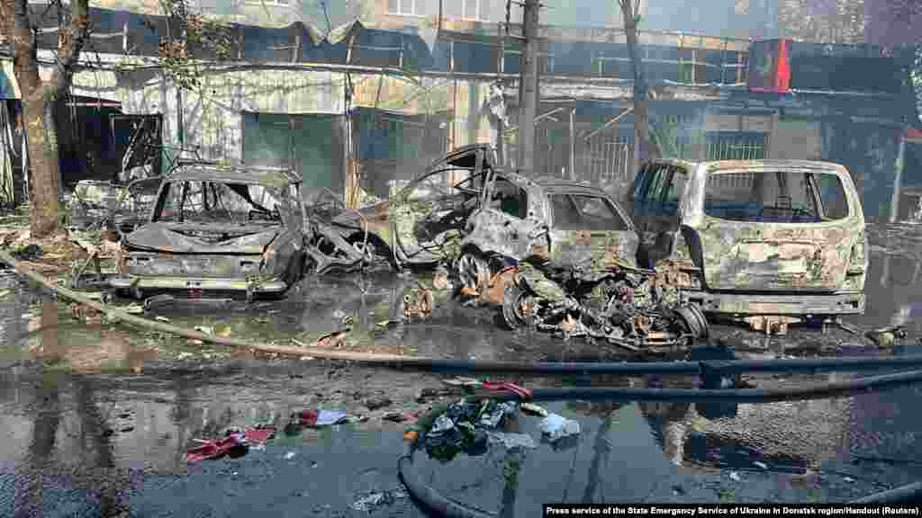 Burned cars are seen at the site of a Russian military strike in Kostiantynivka, Donetsk region, Ukraine. &nbsp;Press service of the State Emergency Service of Ukraine in Donetsk region/Handout via REUTERS