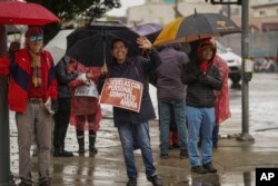 English teachers with United Teachers Los Angeles join the Los Angeles Unified School District teachers and Service Employees International Union 99 members strike in Los Angeles, March 21, 2023.