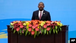 Ethiopian Prime Minister Abiy Ahmed delivers a speech on stage during the Belt and Road Forum at the Great Hall of the People in Beijing, Oct. 18, 2023.