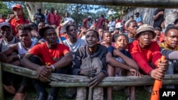 FILE - Economic Freedom Fighters protest in front of the presidential Guest House in Pretoria, South Africa, March 20, 2023, during a national shutdown called by their party.