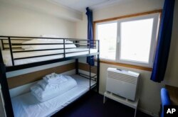 A view of inside one of the bedrooms onboard the Bibby Stockholm accommodation barge, which will house up to 500 asylum-seekers, at Portland Port in Dorset, England, July 21, 2023.