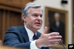 FBI Director Christopher Wray testifies before a House committee about the July 13 shooting at a campaign rally in Pennsylvania, July 24, 2024, on Capitol Hill.