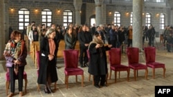 Worshippers celebrate the Easter mass at the Armenian church Surp Giragos, in Diyarbakir, southeastern Turkey, on April 9, 2023.