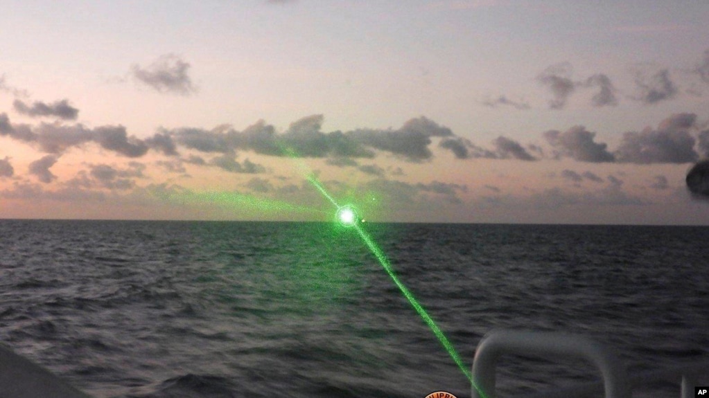 This photo released by the Philippine Coast Guard shows a military-grade green laser beam fired from a Chinese Coast Guard vessel in the disputed South China Sea, February 6, 2023. (Photo: Philippine Coast Guard via AP, File)