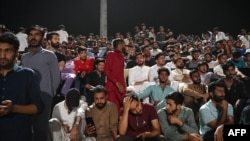 Pakistani fans react after India defeated Pakistan during a live telecast screening of the 2024 ICC men's Twenty20 World Cup cricket match between Pakistan and India, played in New York, at the Rawalpindi Cricket Stadium in Rawalpindi, June 9, 2024. 