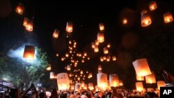 People release lanterns during the celebration of Vesak, which marks the day of Buddha&#39;s birth, death and enlightenment at the 9th century Borobudur Temple in Magelang, Central Java, Indonesia.