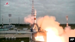 Rhe Soyuz-2.1b rocket with the moon lander Luna-25 automatic station takes off from a launch pad at the Vostochny Cosmodrome in the Russia's Far East. (Roscosmos State Space Corporation via AP)