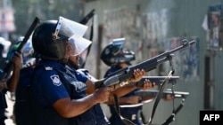 Police fire rubber bullets in an attempt to disperse Bangladesh Nationalist Party (BNP) activists as they attempt to block a highway in Araihazar, some 40km from Dhaka, Oct. 31, 2023. 