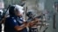 Police fire rubber bullets in an attempt to disperse Bangladesh Nationalist Party (BNP) activists as they attempt to block a highway in Araihazar, some 40km from Dhaka, Oct. 31, 2023. 