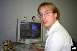 This file photo shows Paul Buchheit, the former Google engineer who created Gmail, works at the company's offices in Mountain View, Calif., in Dec. 10, 1999. (April Buchheit via AP)