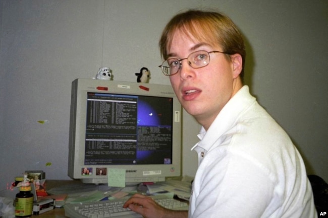 This file photo shows Paul Buchheit, the former Google engineer who created Gmail, works at the company's offices in Mountain View, Calif., in Dec. 10, 1999. (April Buchheit via AP)