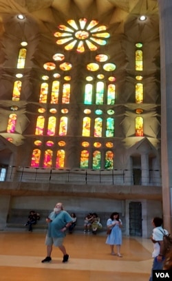 Stained glass windows inside Sagrada Familia are seen Oct. 6, 2023. (Graham Keeley/VOA)