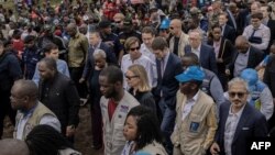 Humanitarian personnel and members of a United Nations Security Council team visit the Bushangara camp for internally displaced persons, north of Goma, Democratic Republic of Congo, March 12, 2023.