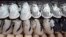 FILE - Yeezy shoes made by Adidas are displayed at Laced Up, a sneaker resale store, in Paramus, New Jersey, on Oct. 25, 2022.