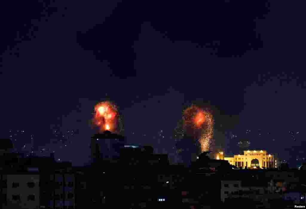 Explosions light up the sky after the Israeli military said in a statement that it has struck Islamic Jihad targets, in Gaza.