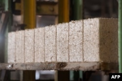 A general view of newly pressed hemp bricks at the Afrimat Hemp brick factory in Cape Town, April 25, 2023.