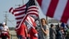 FILE - Supporters of former US President and 2024 Presidential hopeful Donald Trump rally to welcome him at Manchester airport in Manchester, New Hampshire, on May 10, 2023 ahead of his CNN town hall meeting. 