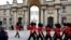 British members of Number 7 Company Coldstream Guards march along the street outside the Elysee Palace, as they make their way into the courtyard, in Paris, France, April 8, 2024. 