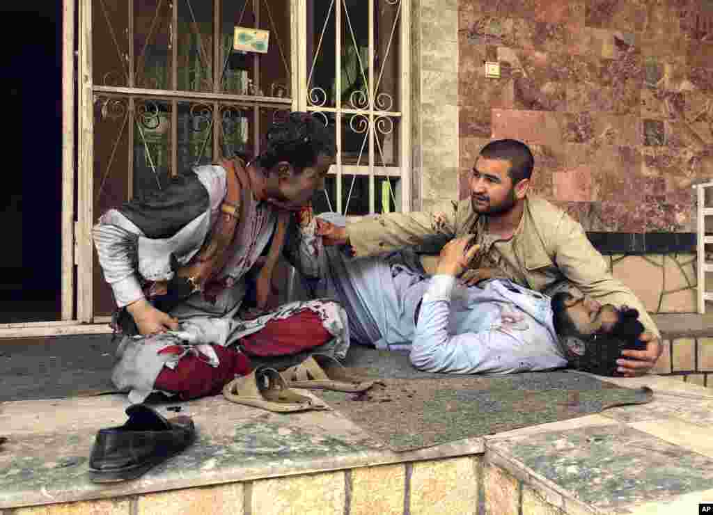 An injured man lies down after a bomb blast in Mazar-e-Sharif, the capital city of Balkh province, in northern Afghanistan, March 11, 2023.&nbsp;A bomb exploded during an award ceremony for journalists in the city.