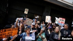 FILE - Teachers protest demanding better salaries in Caracas, Venezuela, Feb. 23, 2023. 