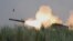 FILE - An M142 High Mobility Artillery Rocket System (HIMARS) fires during Philippine-U.S. exercises at Capas, Philippines, Oct. 13, 2022. The U.S. on Sept. 7, 2023, said it would provide $600 million in additional military aid to Ukraine, including HIMARS ammunition.