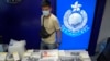 FILE - Barang bukti yang disita ditampilkan saat konferensi pers di markas polisi di Hong Kong, 6 Juli 2021. (AP/Kin Cheung, File)