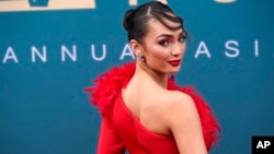 FILE - Miss Universe 2022 R'Bonney Gabriel poses at the 21st Annual Asian American Awards in Beverly Hills, California, Dec. 16, 2023. On her way to winning Miss Universe 2022, she became the first Miss USA of Filipino descent.