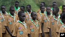 Local Scouts, who are taught about the importance of protecting the environment and building skills, gather in Lafon village, South Sudan, June 18, 2024.