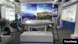 FILE - A model of a flying object which analysts say was part of China’s near space research and development was featured at what appears to be an aeronautical/aerospace exhibition in China in 2015.