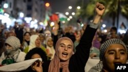 Moroccan protesters take part in a demonstration in solidarity with Palestinians following Al-Quds (Jerusalem) Day, a commemoration in support of Palestinian people on the last Friday of the Islamic holy fasting month of Ramadan, in the city of Casablanca early on April 6, 2024.