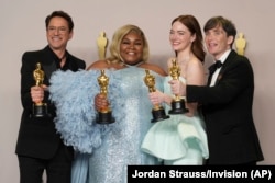 From left, Robert Downey Jr., Da'Vine Joy Randolph, Emma Stone, and Cillian Murphy are winners of acting awards at the Oscars on March 10, 2024, at the Dolby Theatre in Los Angeles. (Photo by Jordan Strauss/Invision/AP)