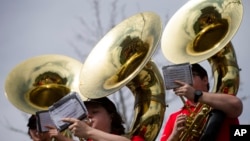 FILE - The University of Cincinnati pep band plays during their spring NCAA college football game, April 2, 2016, in Cincinnati. 