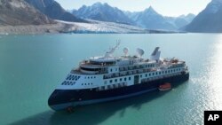 The MV Ocean Explorer, a cruise ship with 206 passengers and crew, which run aground in northwestern Greenland, is pictured Sept. 12, 2023. (SIRIUS/Joint Arctic Command via AP)