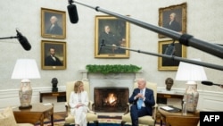 U.S. President Joe Biden meets with Italian Prime Minister Giorgia Meloni in the Oval Office of the White House in Washington, DC, on March 1, 2024.