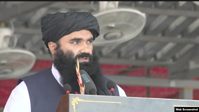 De facto Afghan Interior Minister Sirajuddin Haqqani addressing the Bagram ceremony just outside Kabul Aug 14, 2024, to mark the 3rd anniversary of the Taliban takeover.