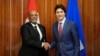 El primer ministro canadiense Justin Trudeau, derecha, participa de una reunión bilateral con su homólogo de Haití, Ariel Henry, durante la conferencia de jefes de gobierno de la Comunidad del Caribe (CARICOM) en Nassau, Bahamas, el 16 de febrero de 2023.