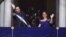 FILE - El Salvador's President Nayib Bukele and first lady Gabriela Roberta Rodríguez wave from a balcony after he was sworn in for a second term, in San Salvador, El Salvador, June 1, 2024. 