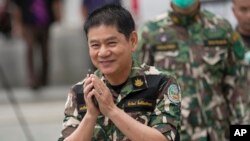 Chaiwat Limlikit-aksorn, a former chief of Kaeng Krachan National Park in the western Phetchaburi province, arrives at The Central Criminal Court of Corruption and Misconduct in Bangkok to hear his verdict in his trial, Sept. 28, 2023. 