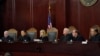 FILE - Arizona Supreme Court Justices listen to oral arguments on April 20, 2021, in Phoenix. The court ruled on April 9, 2024, that the state can enforce its long-dormant law criminalizing all abortions except when a mother’s life is at stake. 