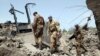 U.N. peacekeepers inspect a bridge hit by an Israeli airstrike, in Maaliya, Lebanon, April 7, 2023. Israel launched rare strikes in southern Lebanon early Friday and bombed targets in the Gaza Strip. The strikes followed violence this week at Jerusalem's most sensitive holy site.