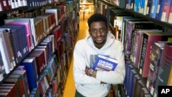 FILE - An Illinois Institute of Technology student originally from Nigeria poses for a portrait Sept. 18, 2020, at the institute's library in Chicago. 