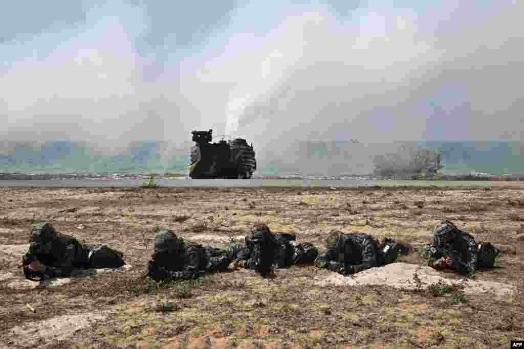 South Korean marines secure the beach during the amphibious landing exercise as part of the joint Cobra Gold exercise in the coastal Thai province of Chonburi.